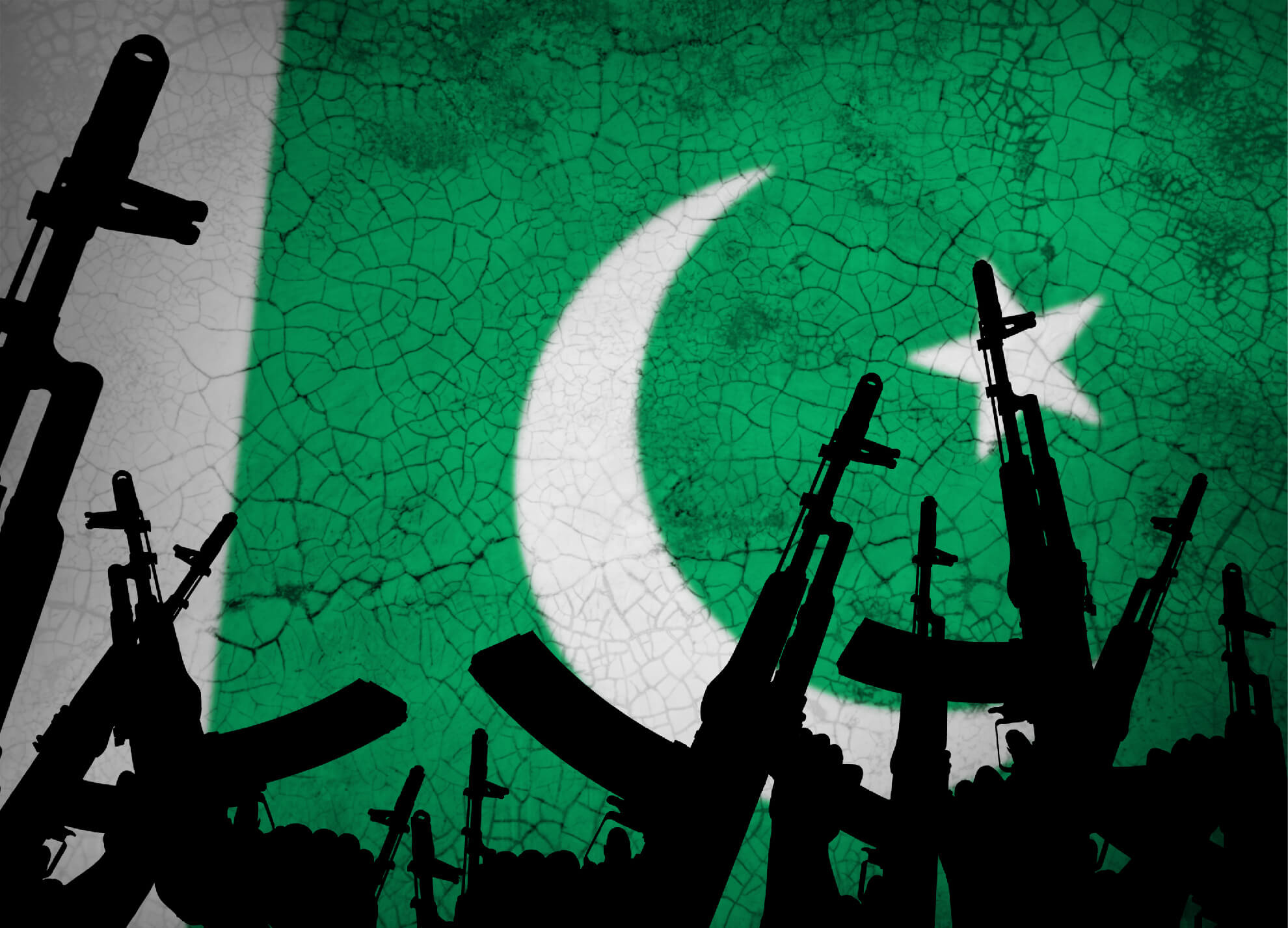 Several automatic rifles raised up on the background of the Pakistani flag